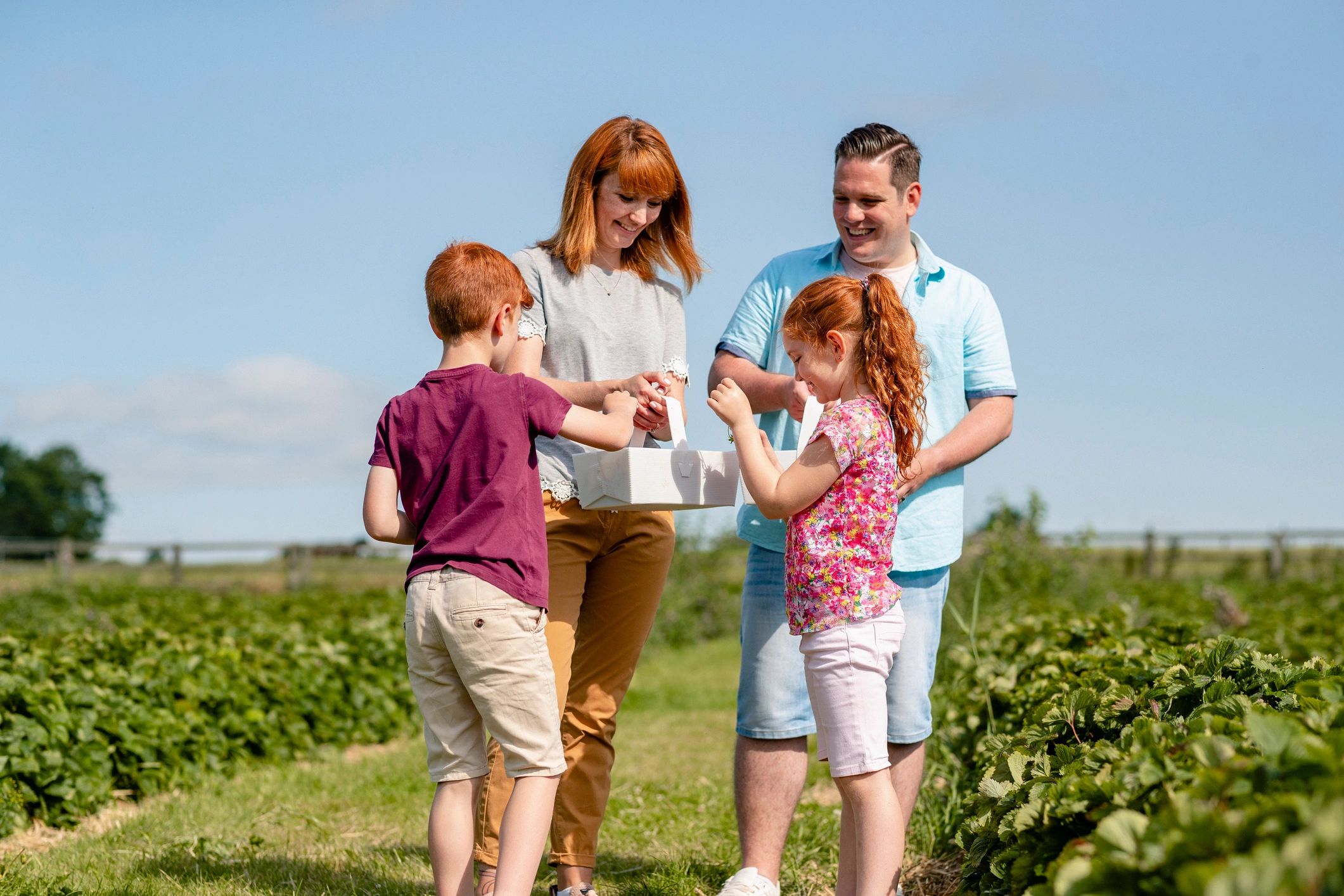 Family enjoying a farm outing together